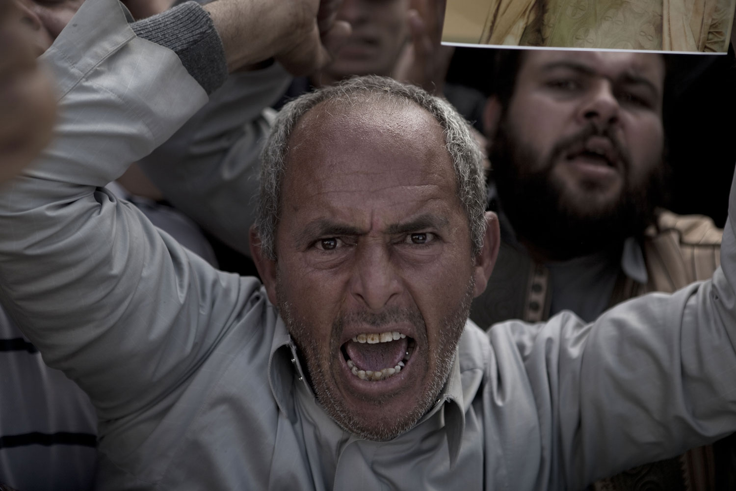 Supporters of Gaddafi vent their anger towards the foreign media in Ban-Waled, March 23, 2011.