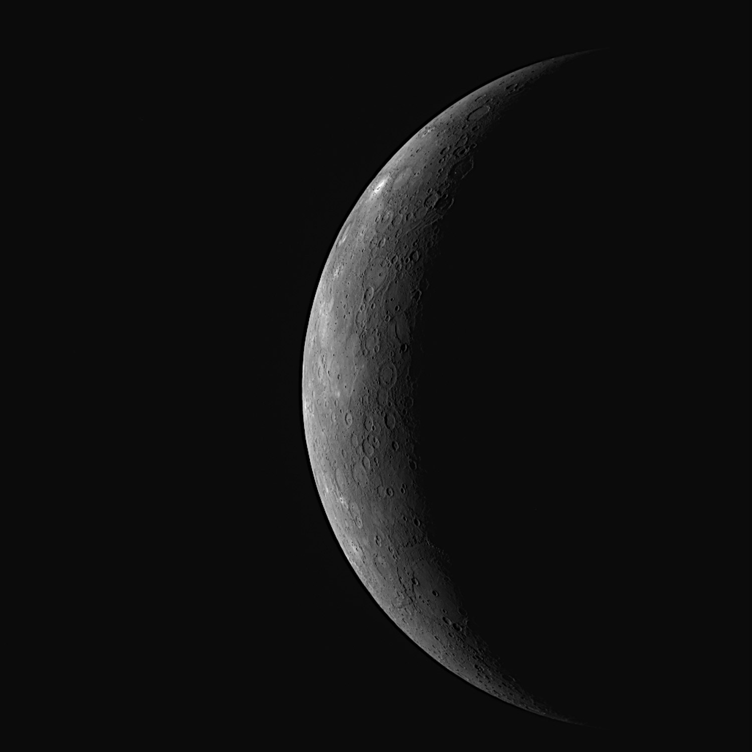 Sailing toward Mercury in 2008, Messenger took this picture of the world in a peaceful-looking crescent. Mariner 10 photographed this region in 1974, but the sun was poorly situated that day, located directly overhead. That washed out shadows and made the topography impossible to read. Here, the oblique illumination provides a much better representation of the planet.