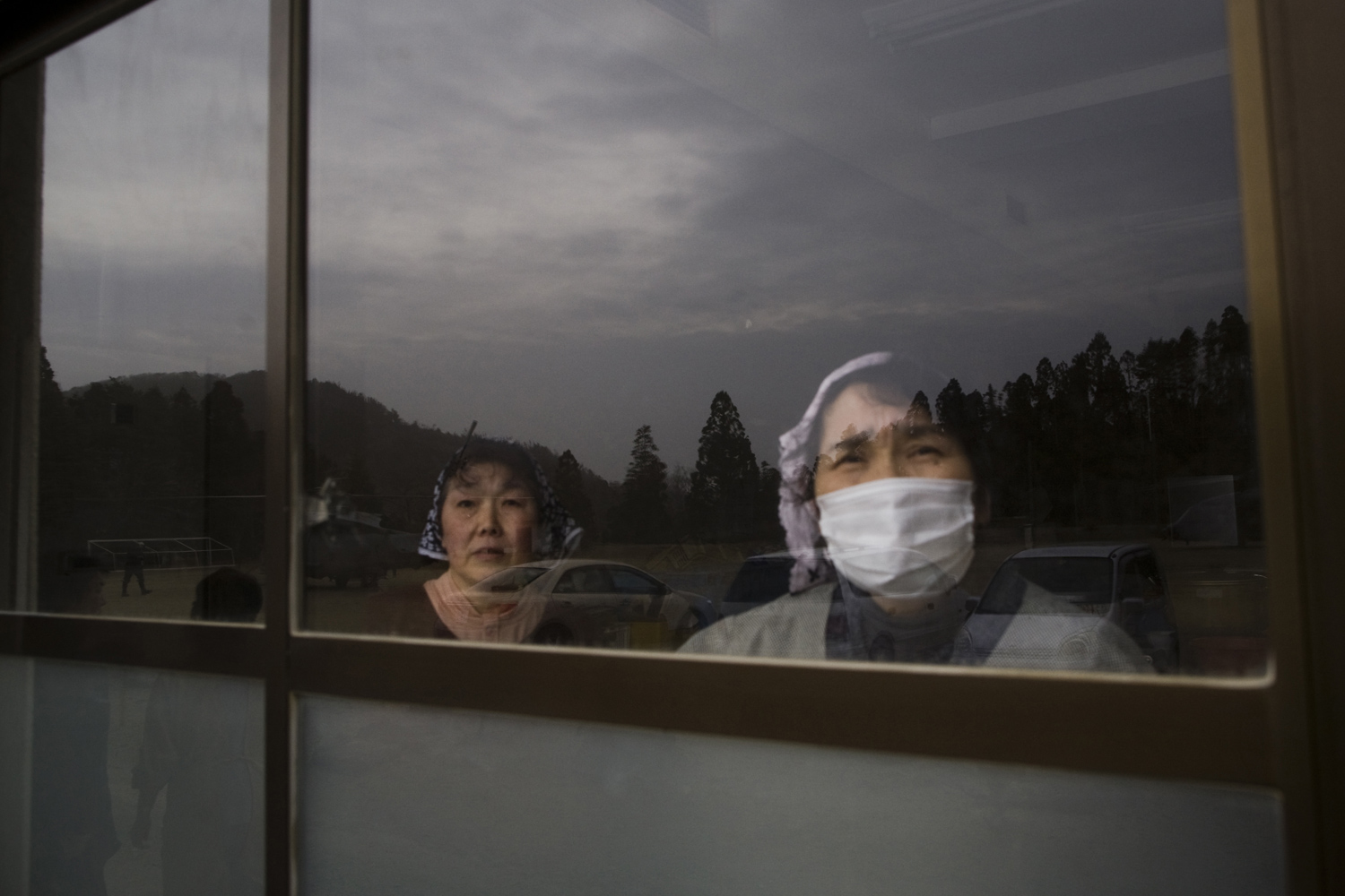 Women taking refuge at a school in a part of the Sendai region that was badly damaged in the earthquake and tsunami. March 21, 2011