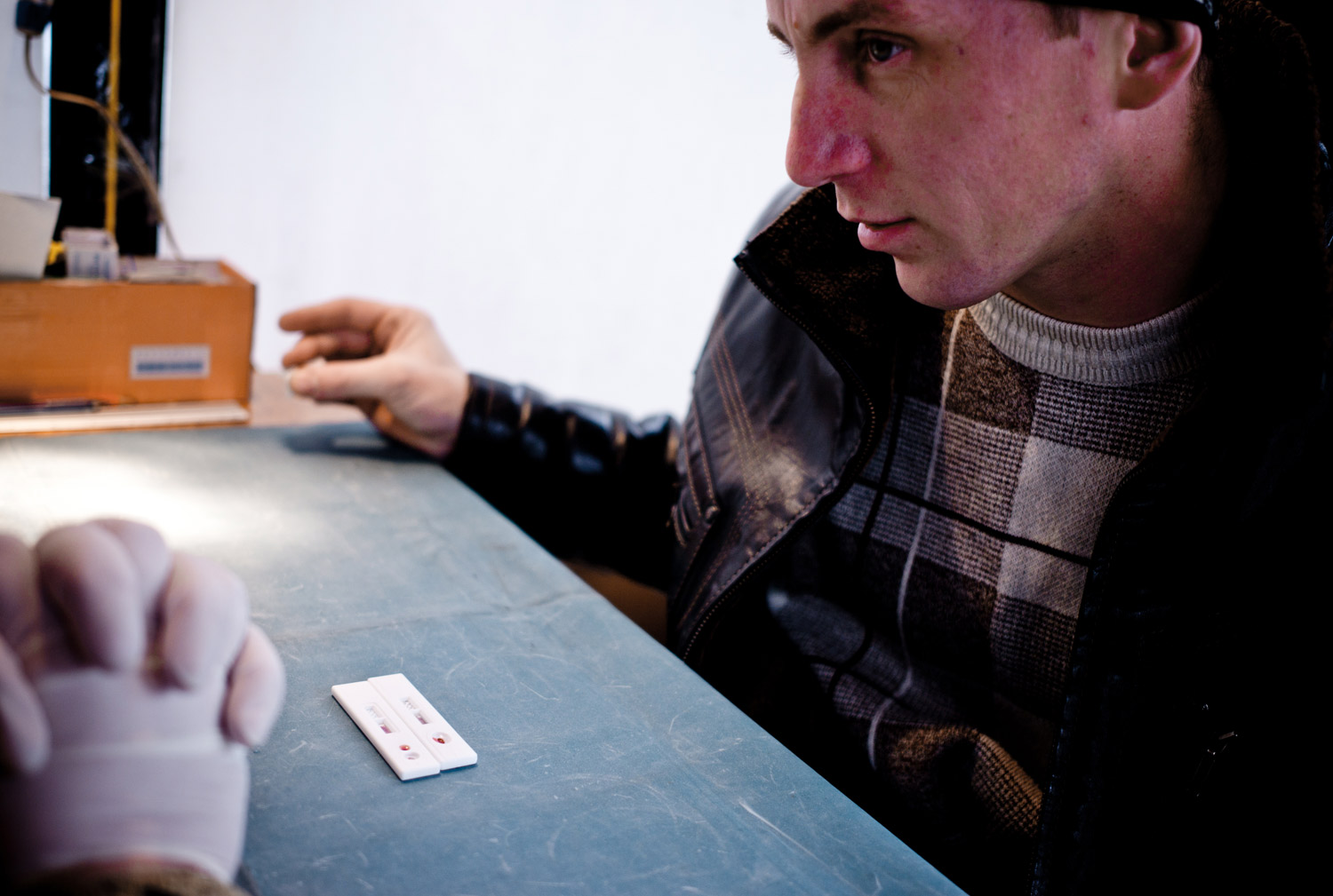 At a mobile facility organized by Amicus, an NGO offering comprehensive care for people living with HIV/AIDS, patients can exchange needles and get blood tests. A high rate of HIV/AIDS has also contributed to the spread of TB in the Ukraine, as the compromised immune systems of HIV patients make them susceptible to the disease's predatory ways.