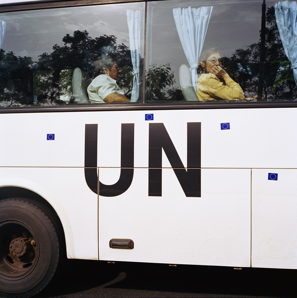 United Nations Mission in Liberia (UNMIL) staff arrive at the inauguration of Gyude Bryant as chairman of the National Transitional Government. Monrovia, 2003..
