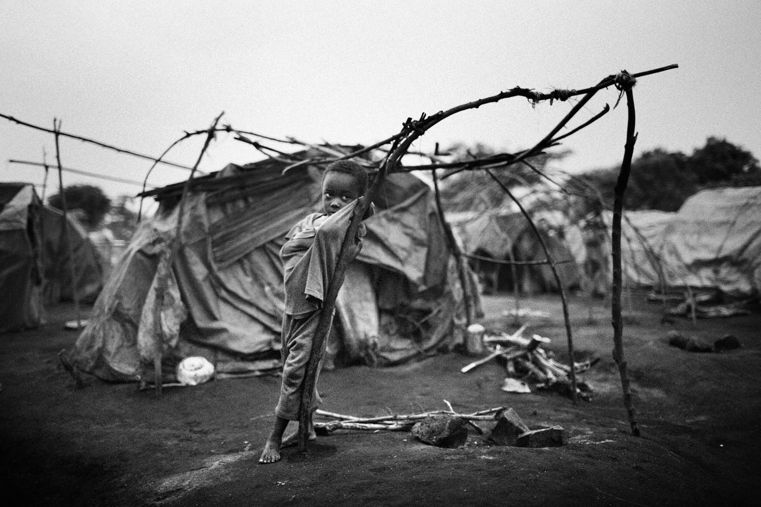Opangi Molati, 5, in Tchomia camp after being displaced by nearby fighting, 2006.  This is also where the Pastor introduced me to his brother, who will be donating his kidney.