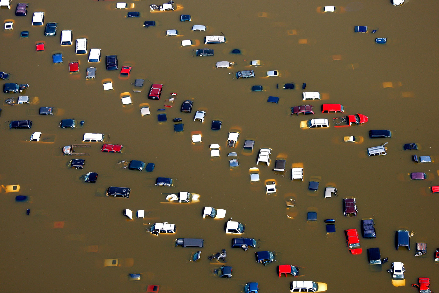 May 10, 2011 - Cars lie submerged in overflow water from the Wolf River on McMiller Road near Jackson. After weeks of rising to historic levels the Mississippi River reached a crest just shy of the forecasted 48 feet at the Memphis gauge.