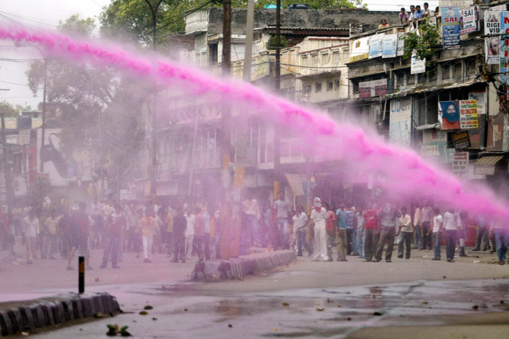 Police use colored water cannon to disperse Hindu protestors at a victory rally in Jammu, India, August 31, 2008.
