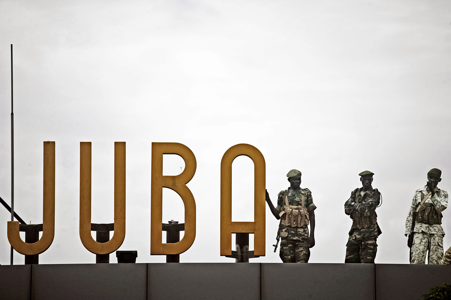 Southern soldiers stand guard on the roof of the airport in Juba, southern Sudan's defacto capital city.