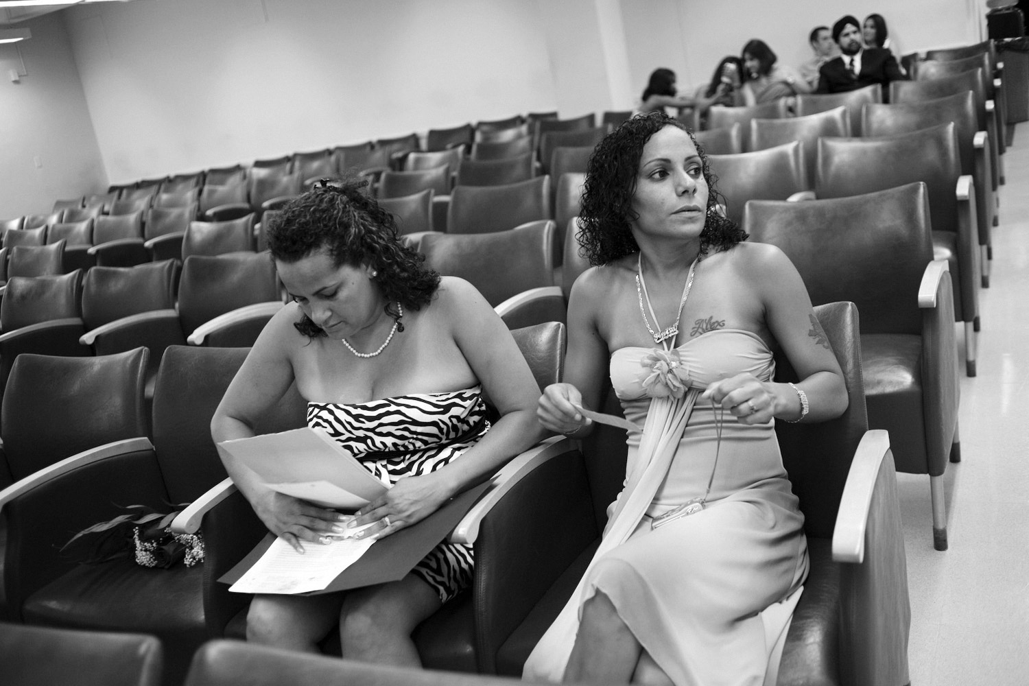 In Queens, Marilyn Rodriguez (left) accompanied by her sister Anita prepares for her wedding ceremony to begin. Marilyn Rodriguez and Judy Ramos (not pictured here) were  previously been legally married in Connecticut, and considered today's ceremony a renewal of their vows.