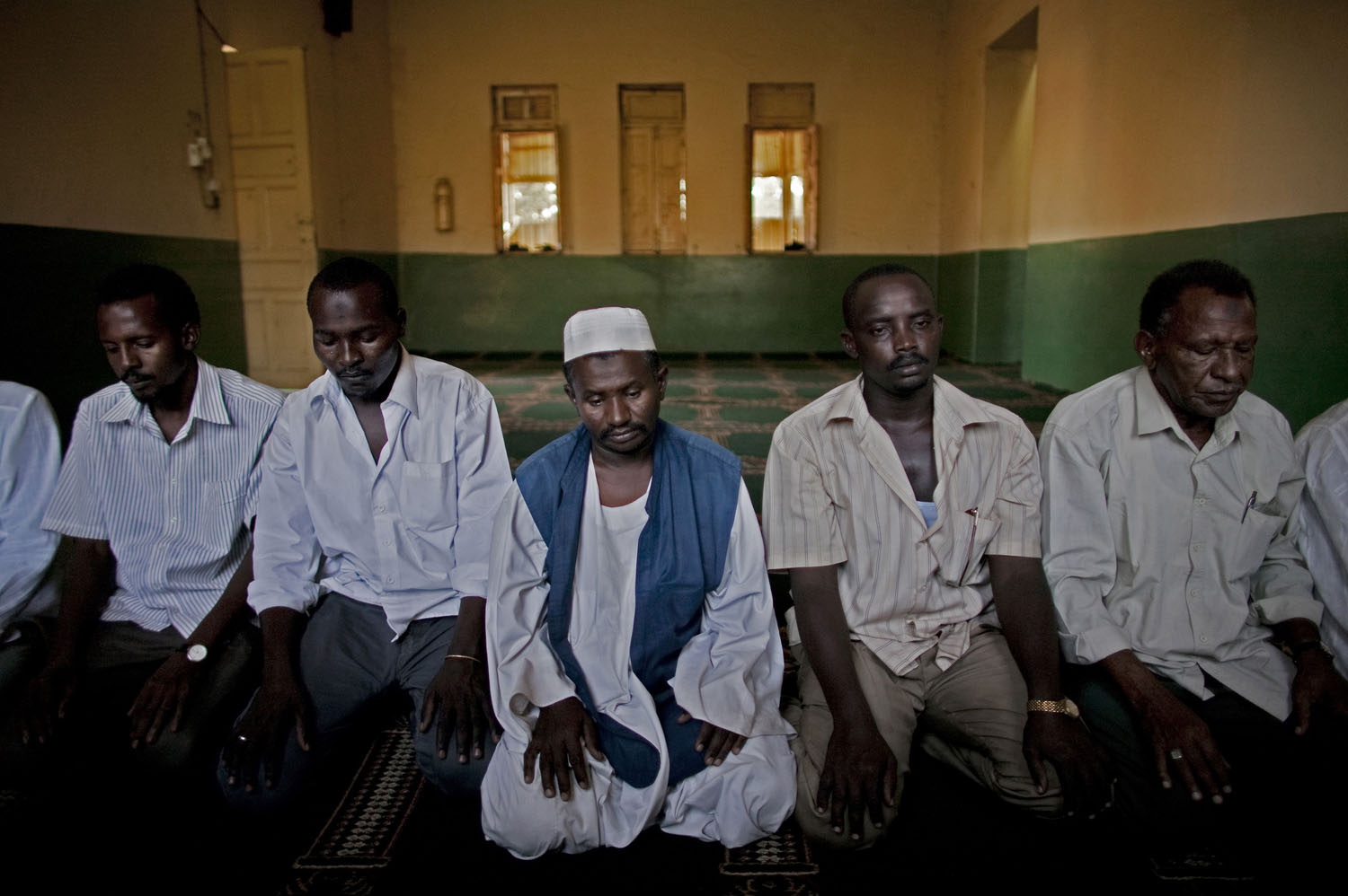 Northern Sudanese traders pray at a mosque in the volatile southern town of Malakal. Thousands of northerners live in the south where they own businesses and facilitate trade with the north. Such traders are the commercial lifeline between southern border towns that are cut off from Juba and therefore dependent on goods from the north.