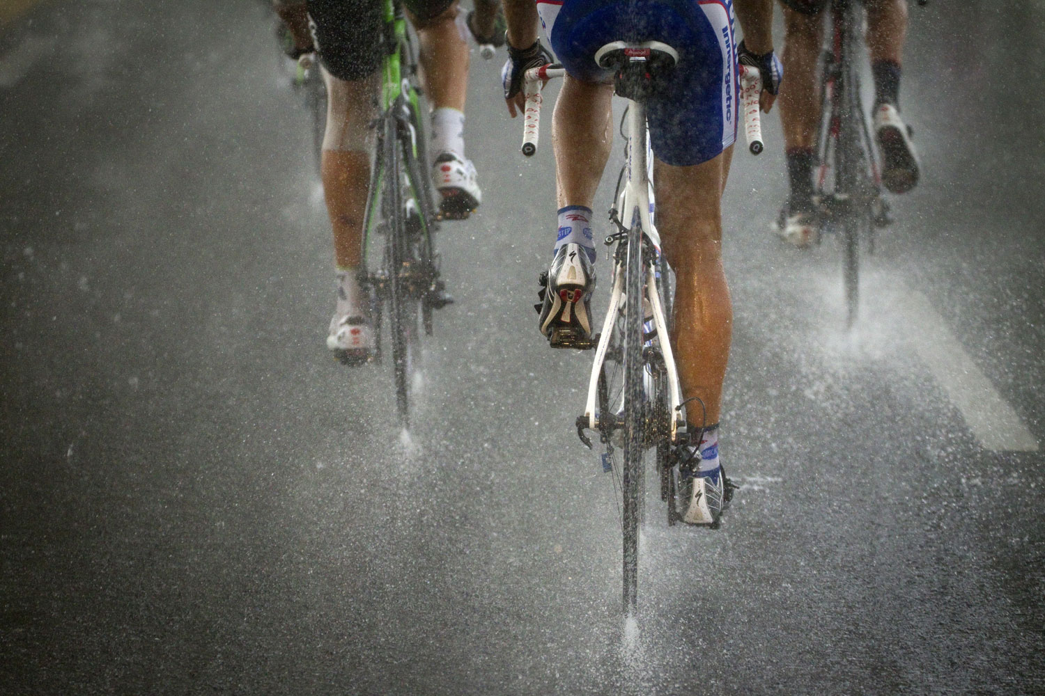 July 13 , 2011. Competitors ride in the rain during the 167.5 km eleventh stage of the 2011 Tour de France cycling race. The stage runs between Blaye-les-Mines and Lavaur, in Pays de Cocagne, southern France.