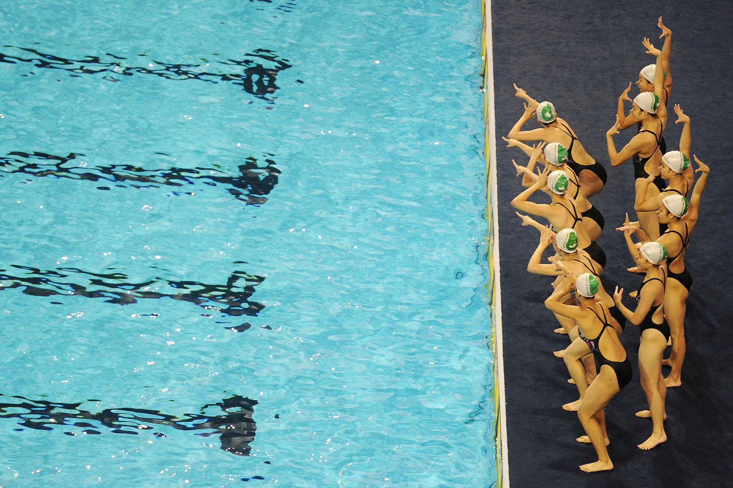 July 15, 2011. Members of the Macau synchronized swimming team practice prior to the start of the 2011 FINA World Swimming Championships in Shanghai, China.