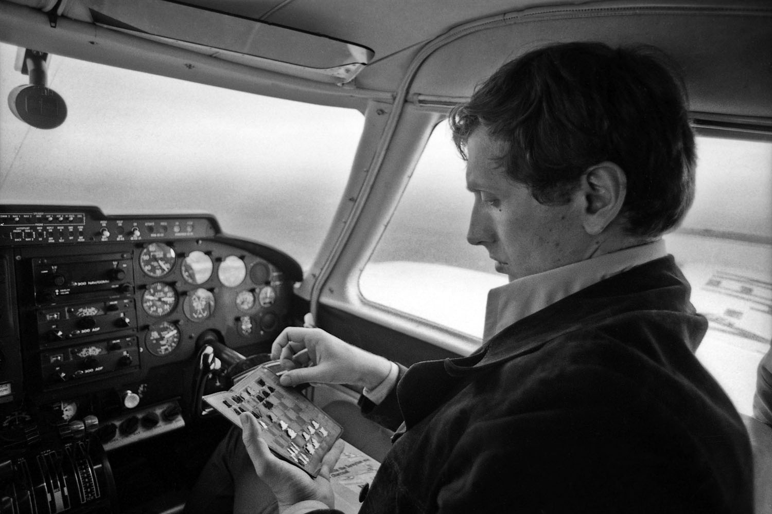 Fischer practices aboard a small plane, Argentina, 1971