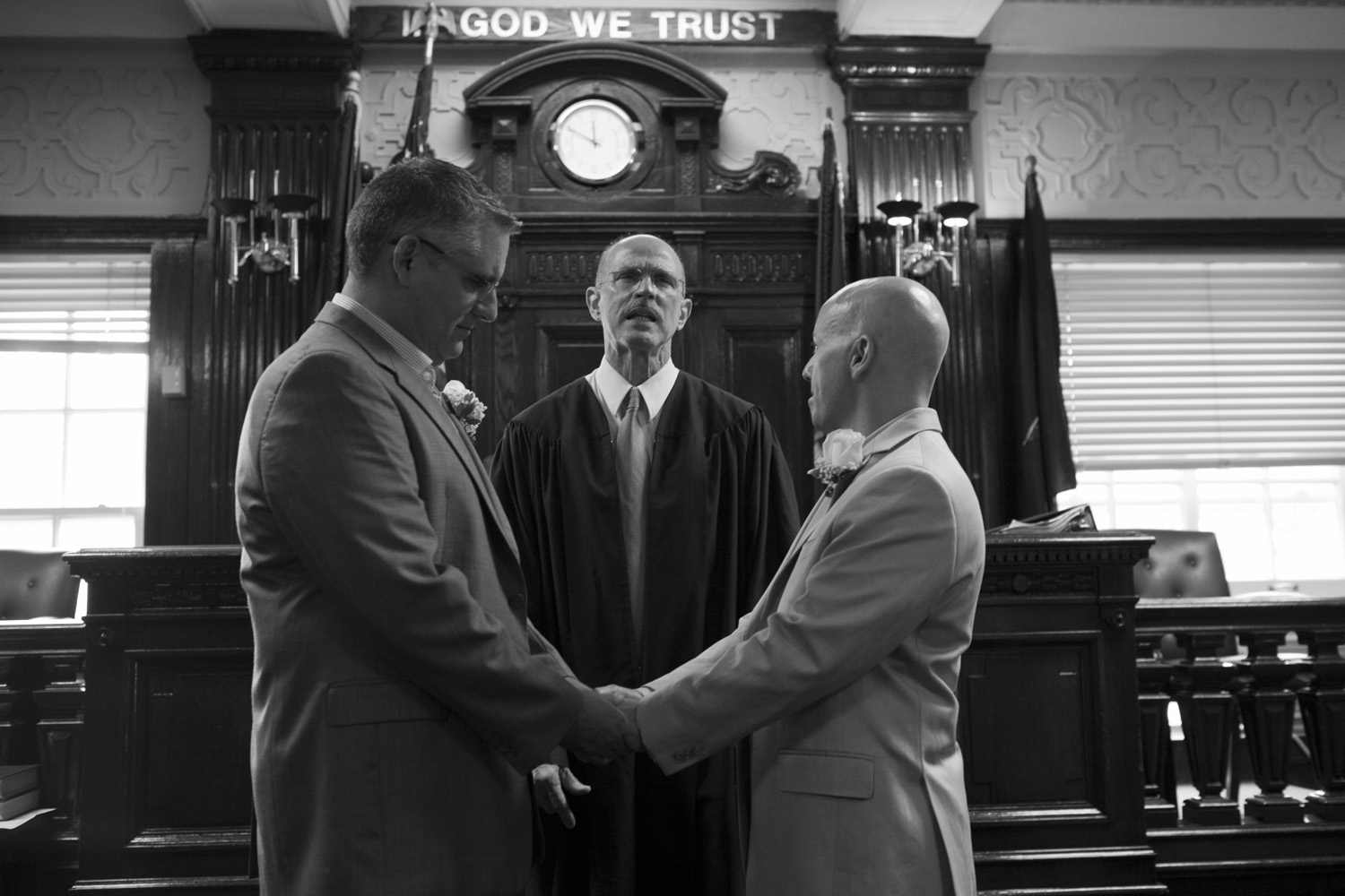 Anthony Lodico (left) and Jack Cuffe of Staten Island, hold hands during their wedding ceremony, by Hon. Thomas P. Aliotta at Borough Hall, Staten Island New York on Sunday, July 24, 2011.