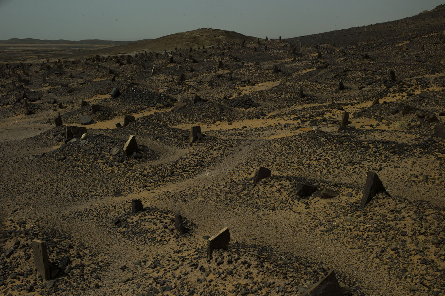 Morocco, Merzouga , 2011. 
                              An ancient cemetery in the northern edge of the Sahara desert in present day Morocco.