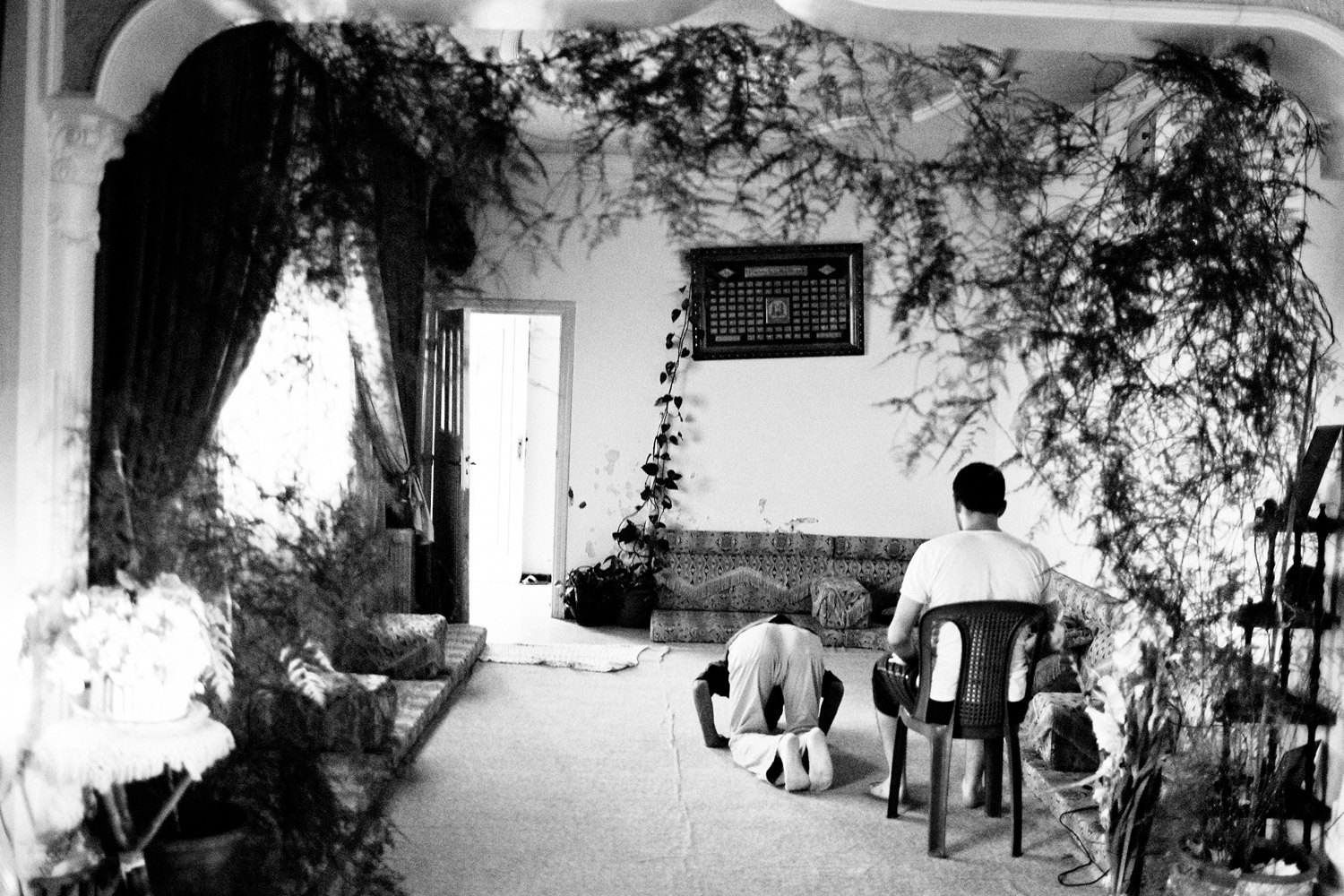 Leaders of the Syrian anti-regime protest movement in Homs pray inside a safe house at an undisclosed location, July 17, 2011.