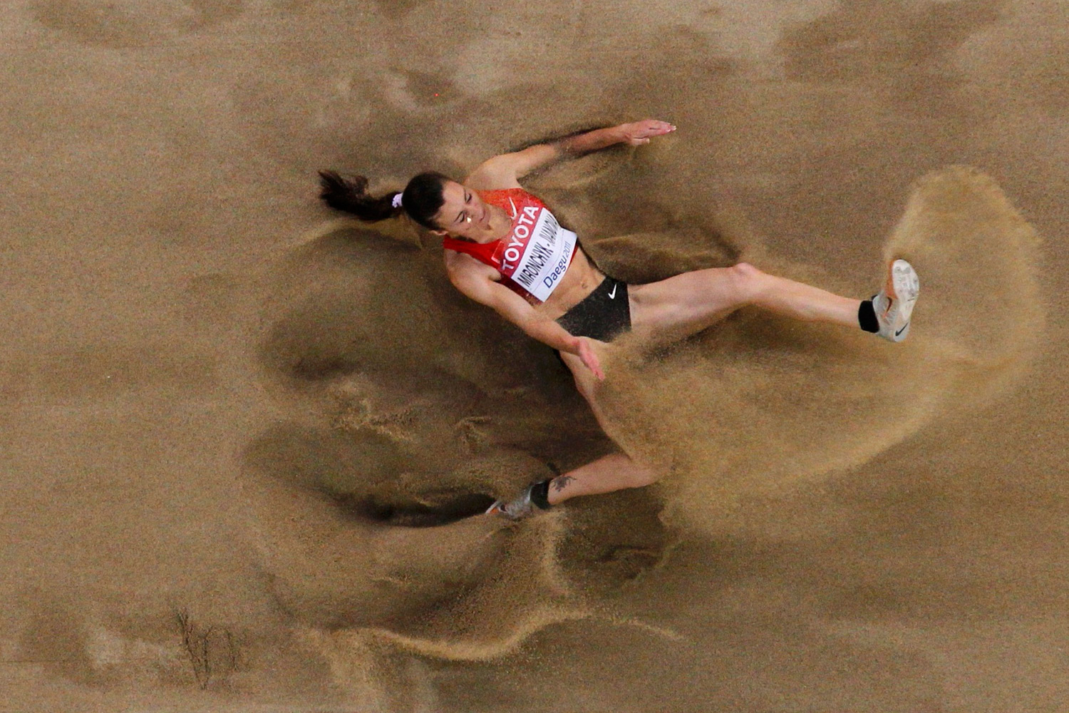 Nastassia Mironchyk-Ivanova of Belarus competes during the women's long jump final at the IAAF World Championships in Daegu, South Korea, August 28, 2011.