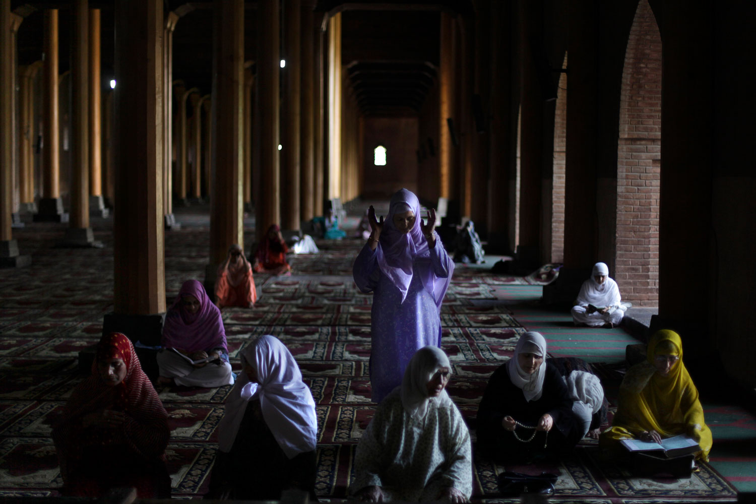 August 10, 2011.Kashmiri Muslim women pray inside the Jamia Mosque in Srinagar, India. Muslims around the world are marking the holy fasting month of Ramadan, where the devout fast from dawn until dusk.