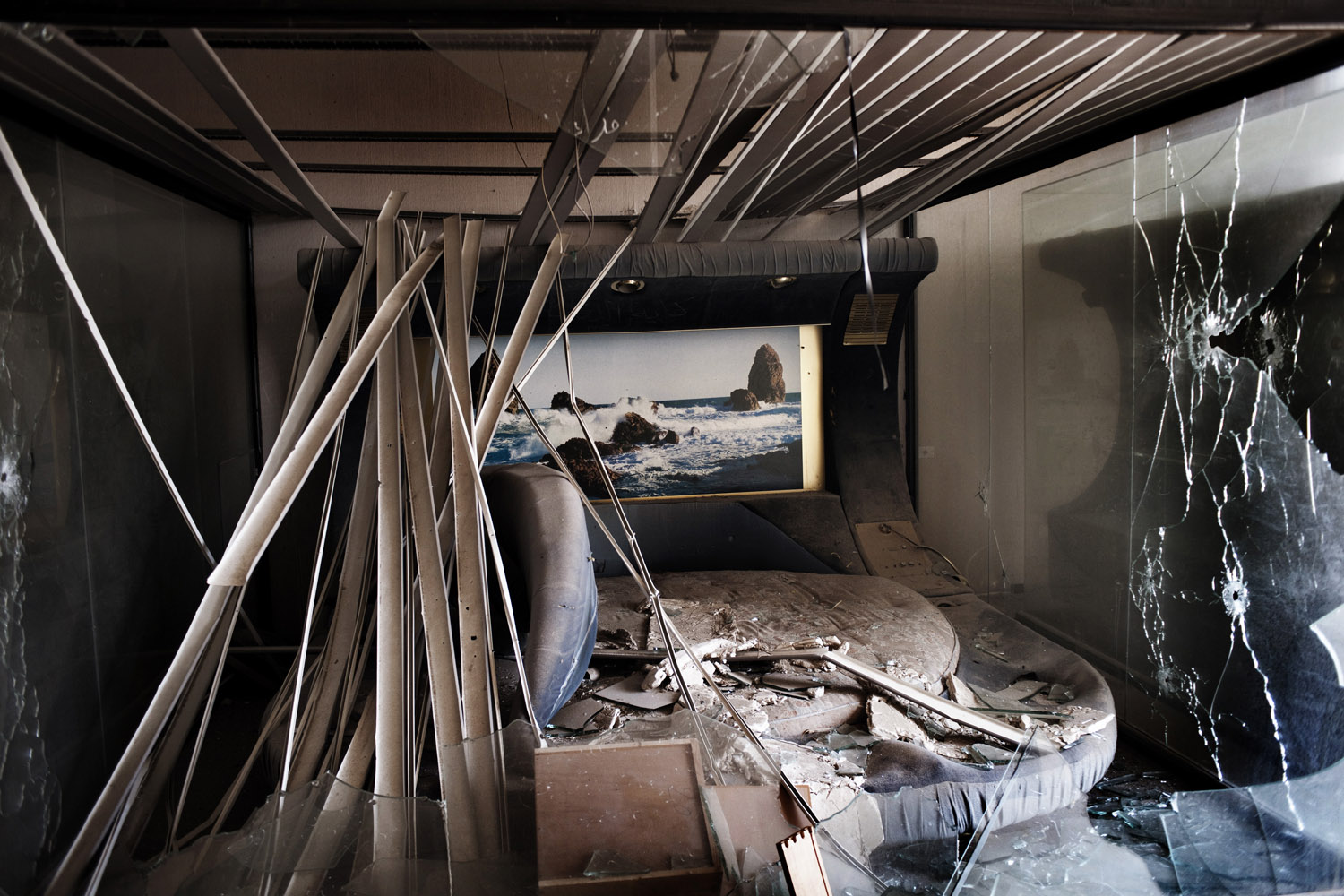 A destroyed bedroom inside Gaddafi's Bab al-Aziziya compound, August 24, 2011.