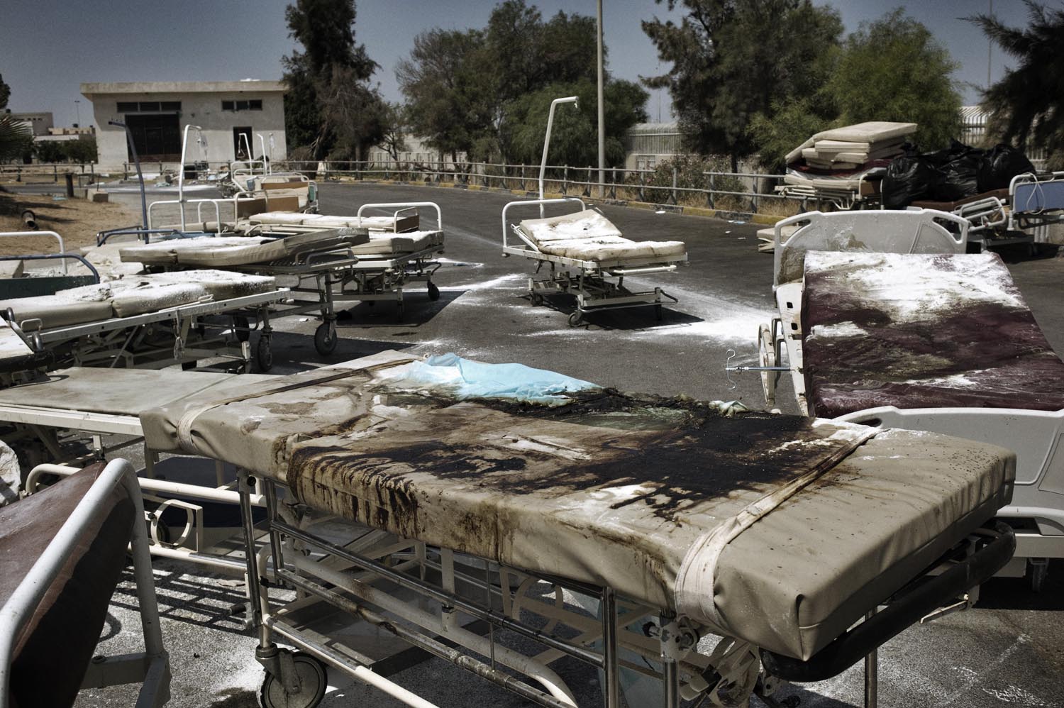 Nearly 200 dead bodies were discovered at the abandoned Abu Slim hospital in Tripoli. Empty gurneys were strewn across the hospital grounds, August 27, 2011.