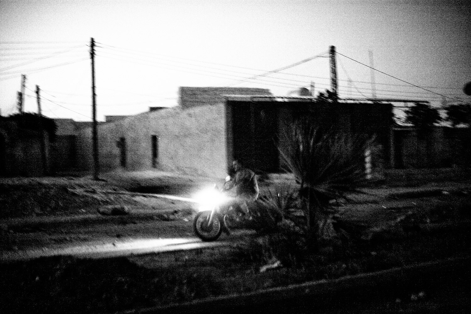 A man rides a motorcycle in Hama, July 17, 2011.