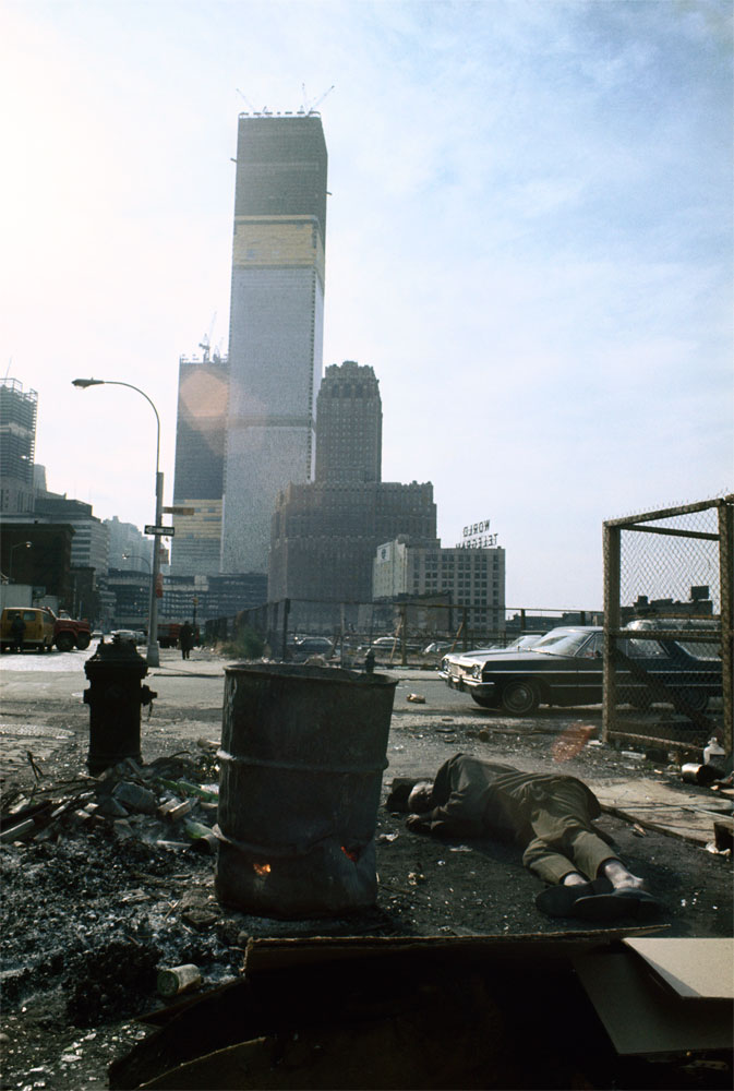 View of the World Trade Center under construction from Duane Street, Manhattan, 1970. The homeless man in this image woke up as he was being photographed and asked Vergara to buy him a ham sandwich.