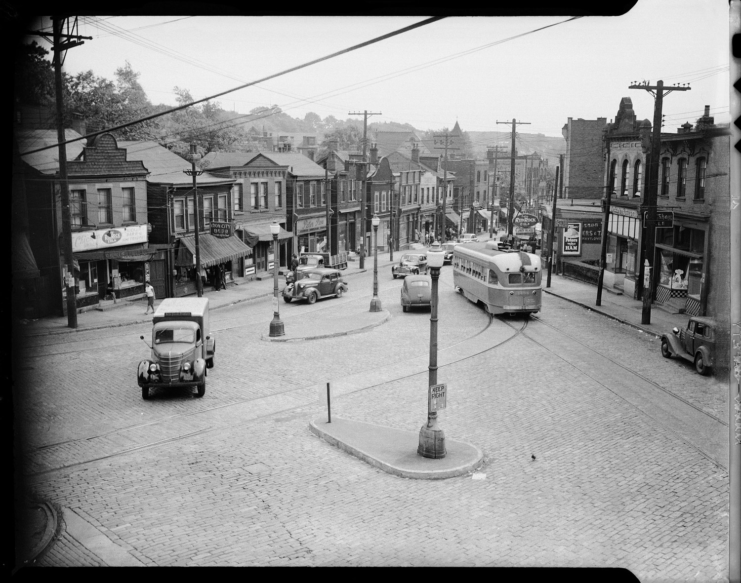 Herron Avenue at the intersection of Milwaukee Street in the Hill District, 1938-1945.