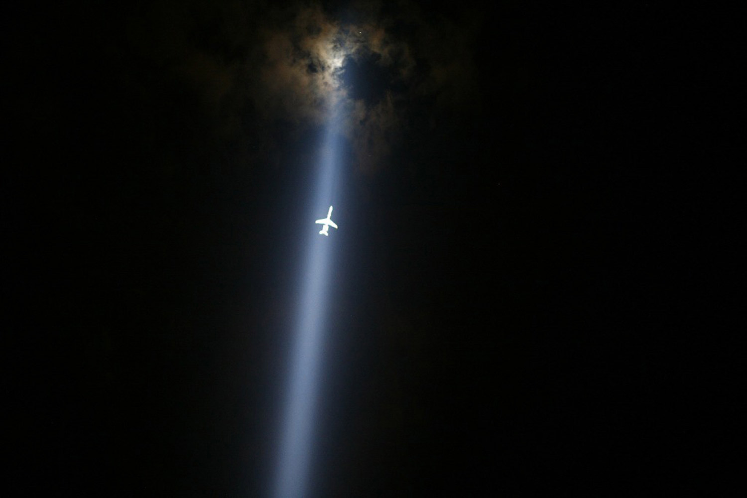 September 10, 2011. A plane flies through the  Tribute in Lights  in lower Manhattan in New York. New York marked the 10th anniversary of the 9/11 attacks on the World Trade Center this year.