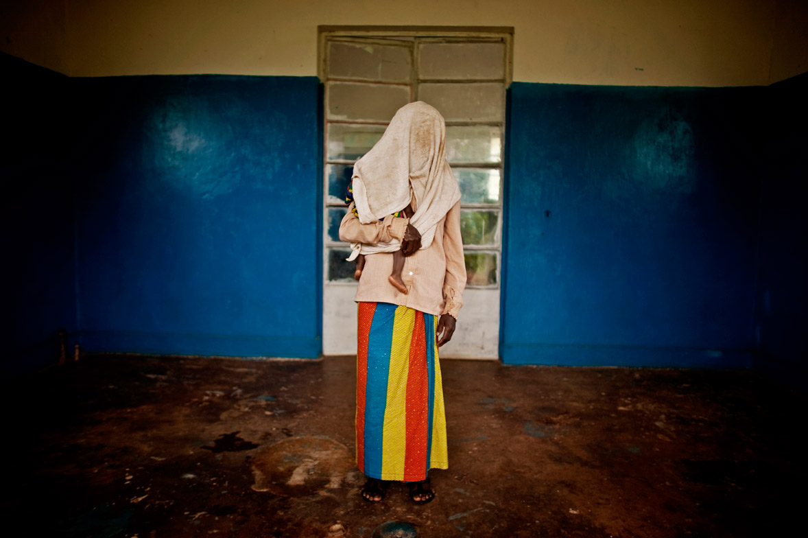 The following seven images are from a portrait series Muller shot on rape victims in the Democratic Republic of Congo. 
                              
                              Portrait #1
                              February  20, 2011. A victim of a mass rape campaign in the town of Fizi, Democratic Republic of Congo (DRC).