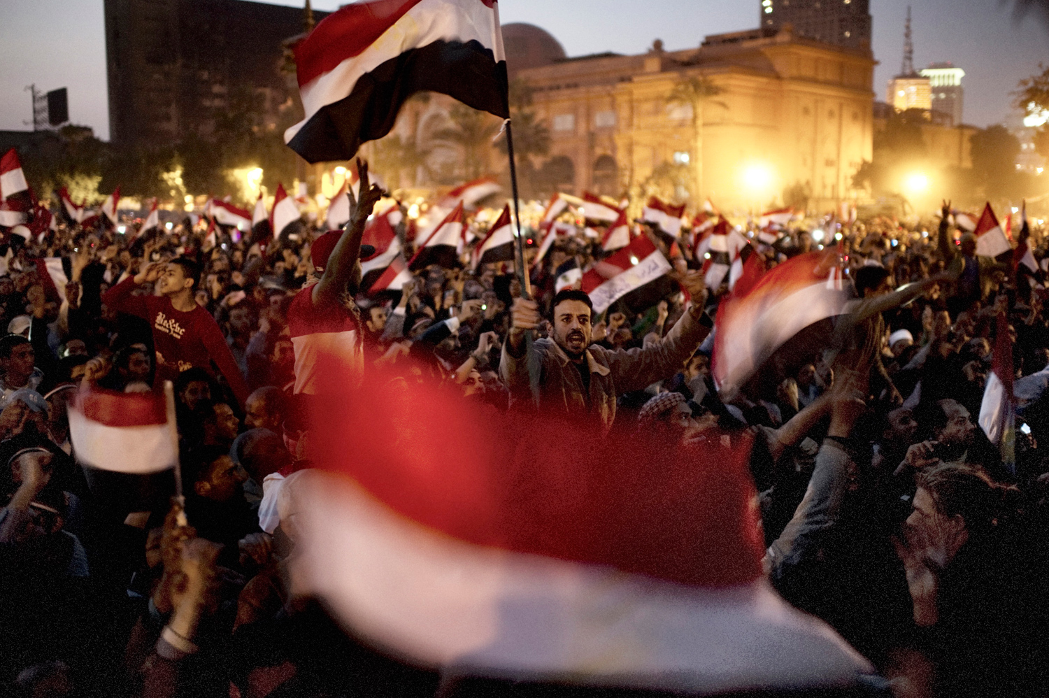Cairo, Egypt — February 11, 2011
                              Anti-government demonstrators celebrate upon hearing the news of Mubarak's resignation.