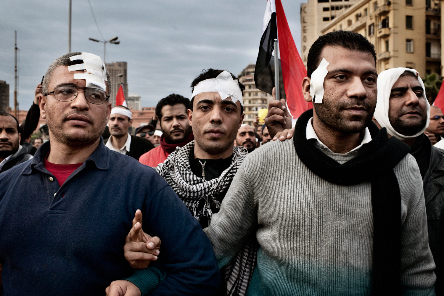 Cairo, Egypt — February 4, 2011
                              Wounded anti-government protesters march through Tahrir Square.