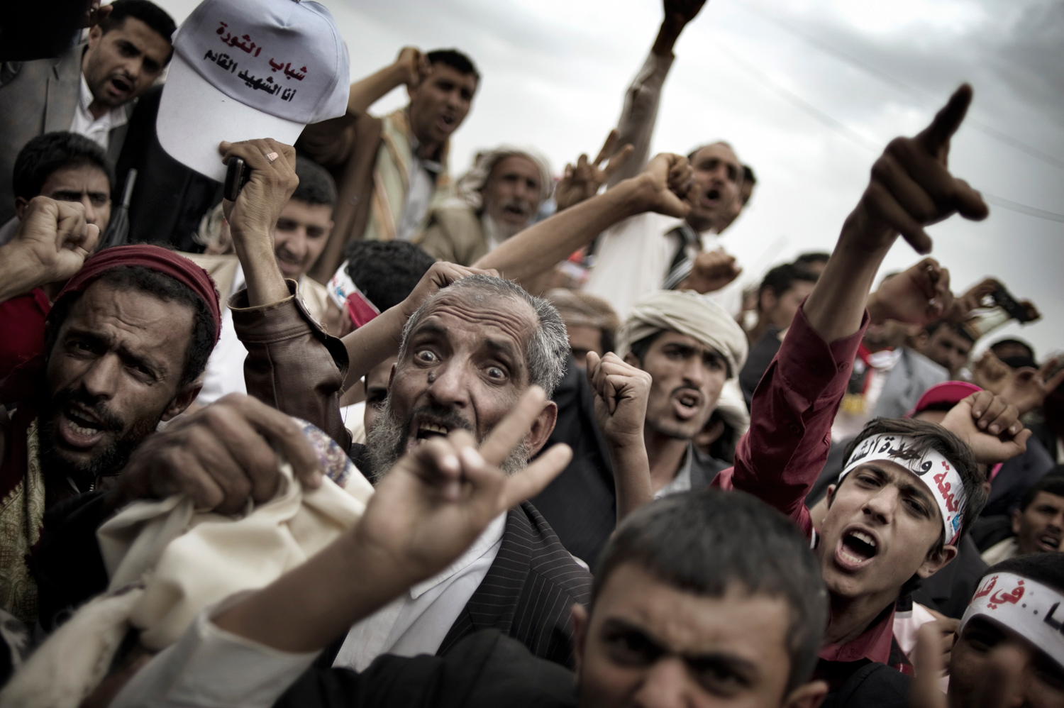 Sana'a, Yemen — May 20, 2011
                              Anti-government protesters shout slogans during a rally to demand Saleh's ouster.