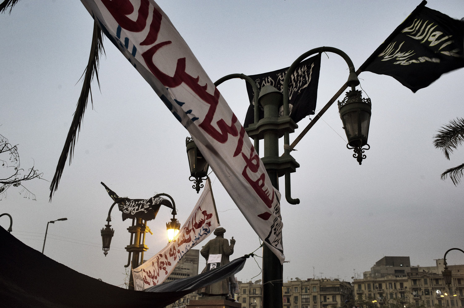 As clashes with police eased, the crowd in Tahrir Square grew larger each day. Banners and flags blanket the square, November 25, 2011.