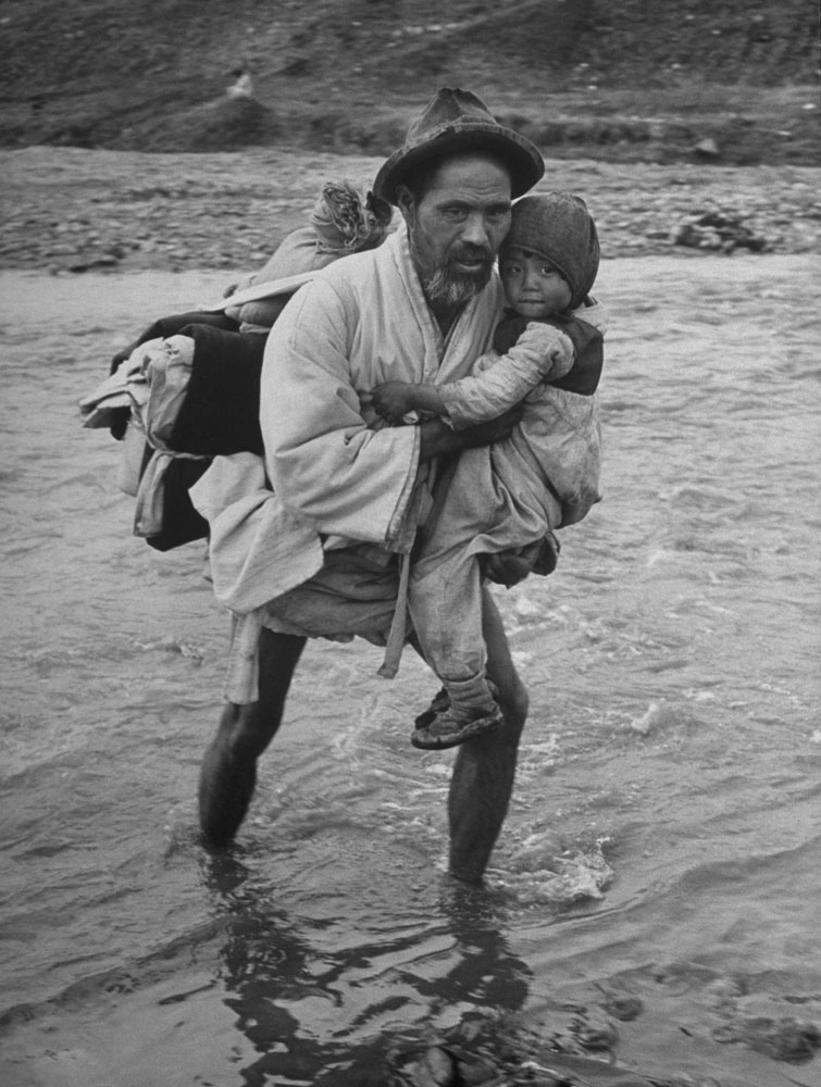 Refugees cross into South Korea, March, 1951
