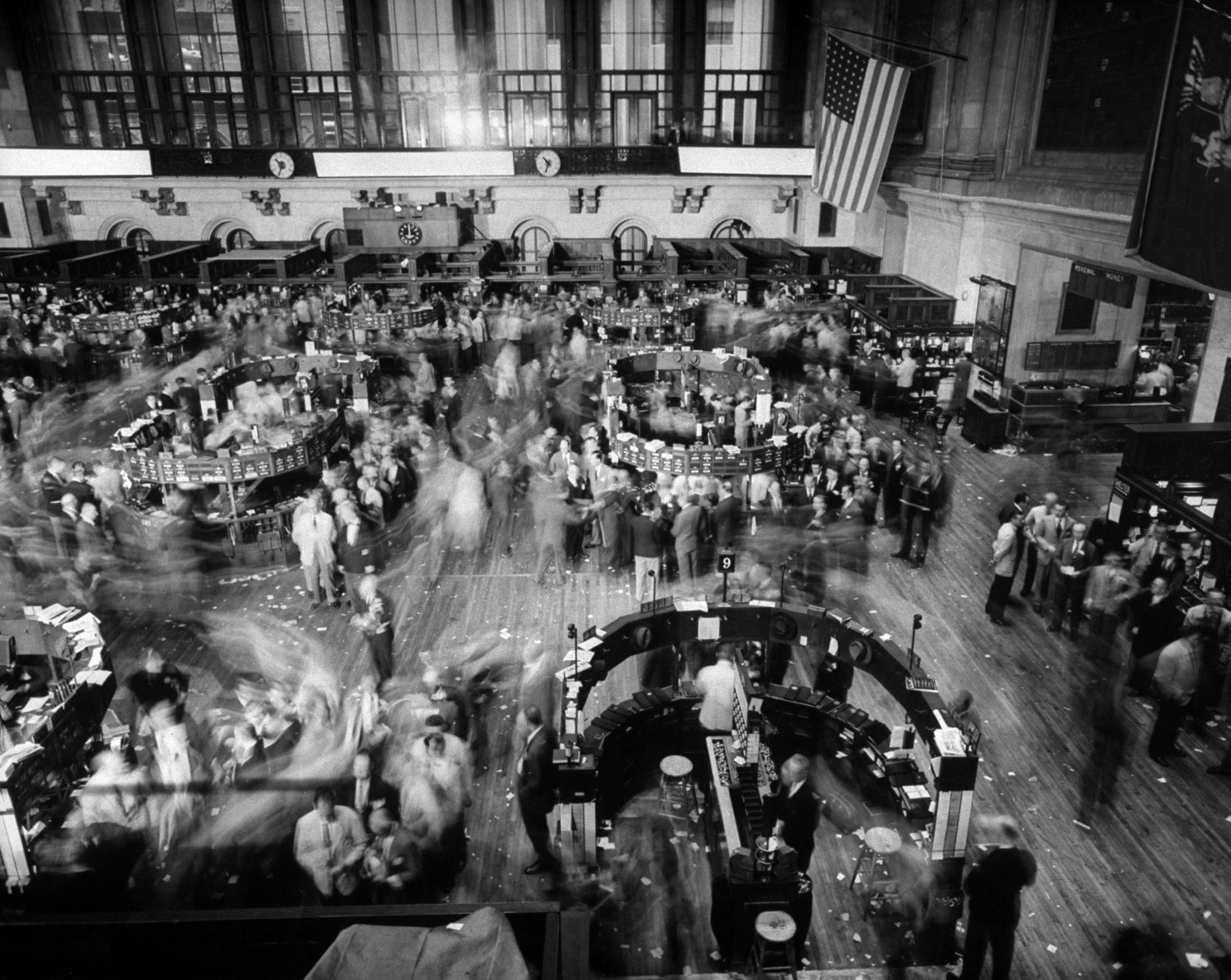 Men leave the floor of the New York Stock Exchange during an air raid drill in November 1951.