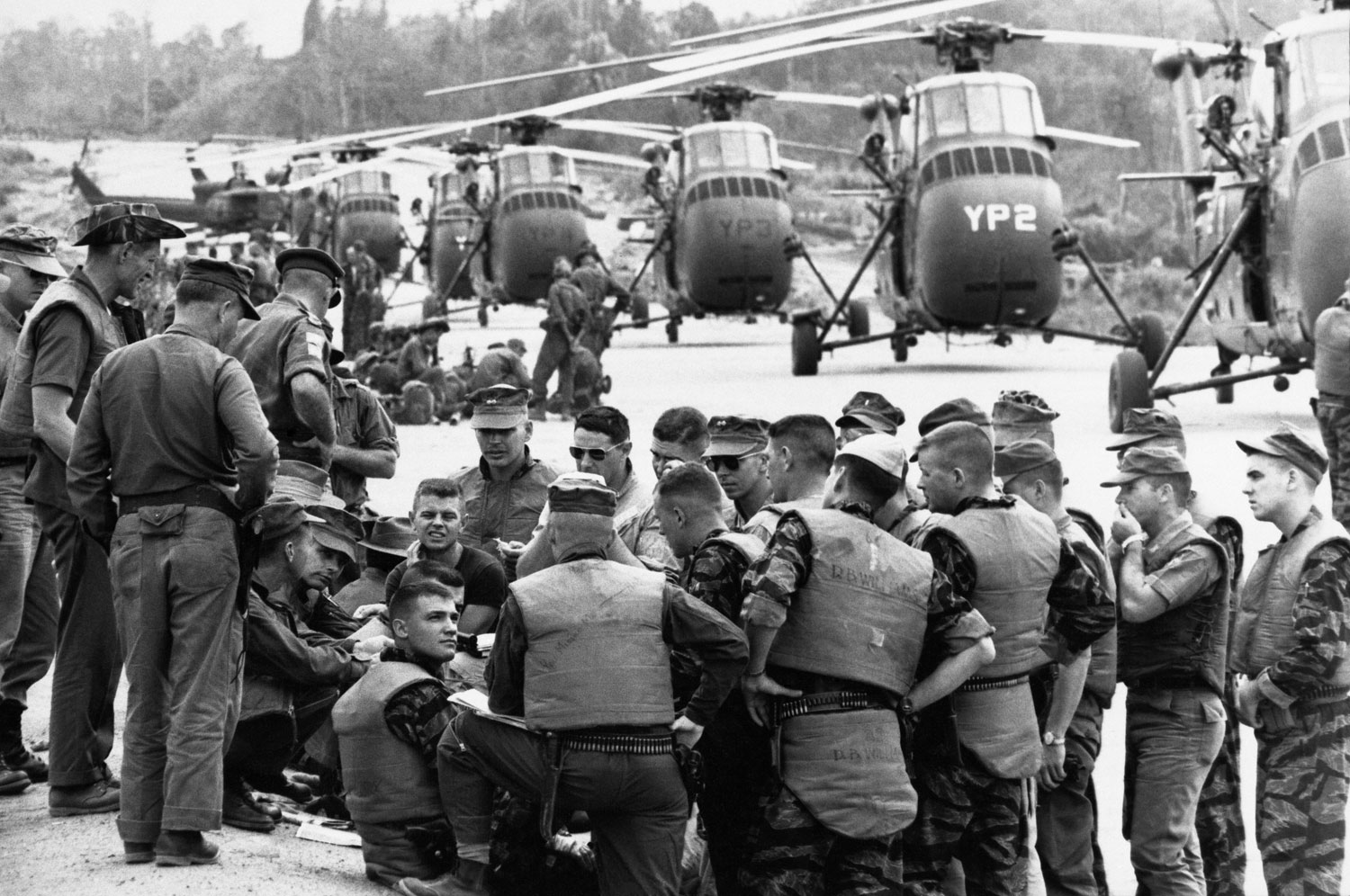 United Sates Marines Helicopter Squadron huddled at Da Nang in 1963 for the final briefing on a March 31, 1965, mission: to airlift a battalion of Vietnamese infantry to an isolated area about 20 miles away.
