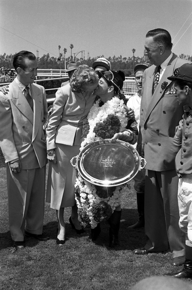 Johnny Longden on the scales at Hollywood Park in 1945.