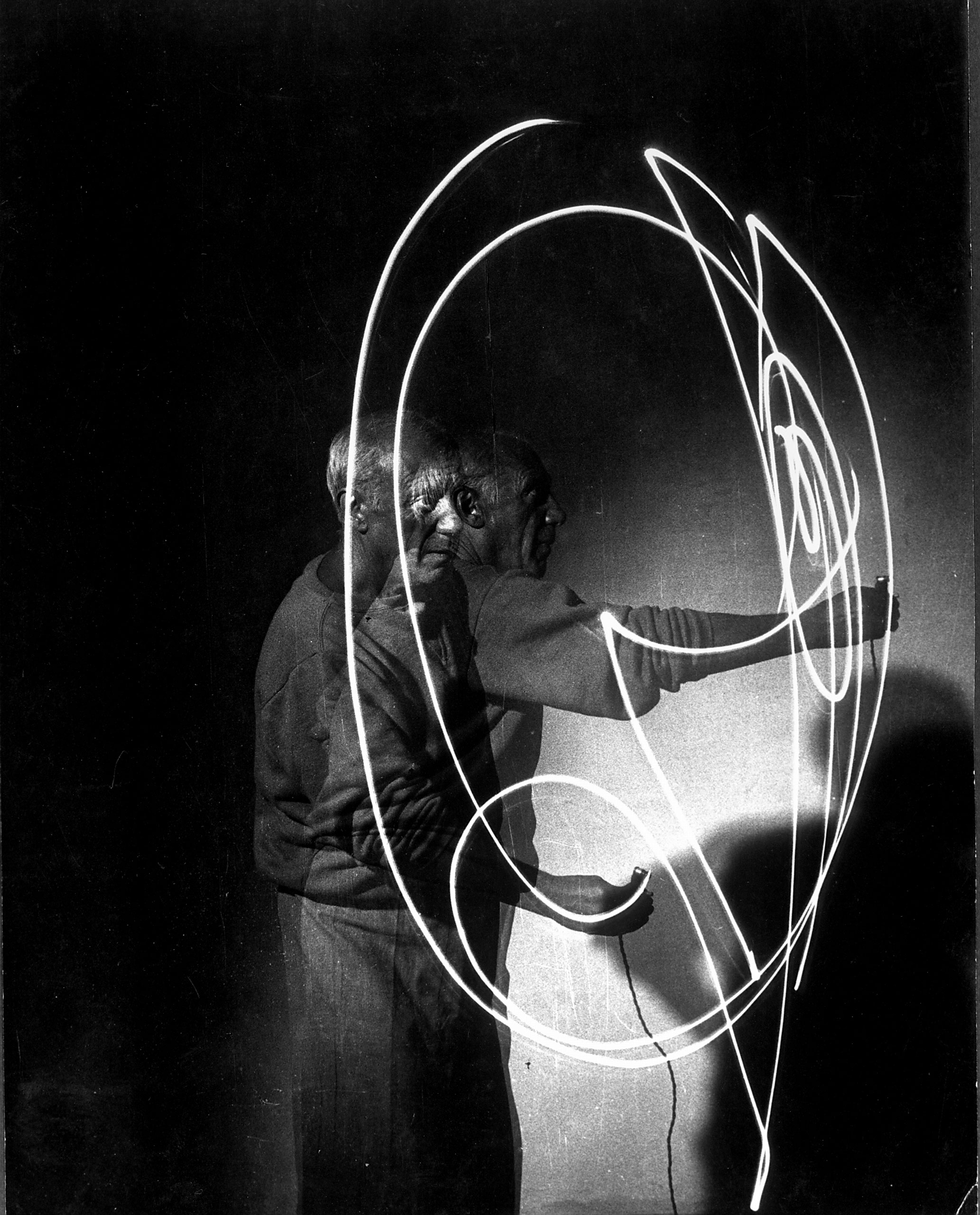 Pablo Picasso creates a light drawing, 1949.