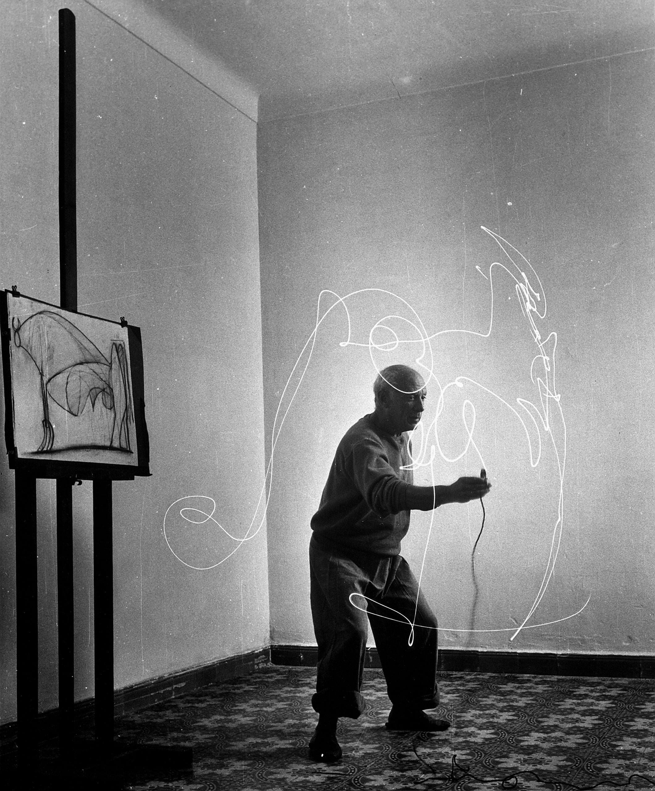 Pablo Picasso creates a light drawing, 1949.