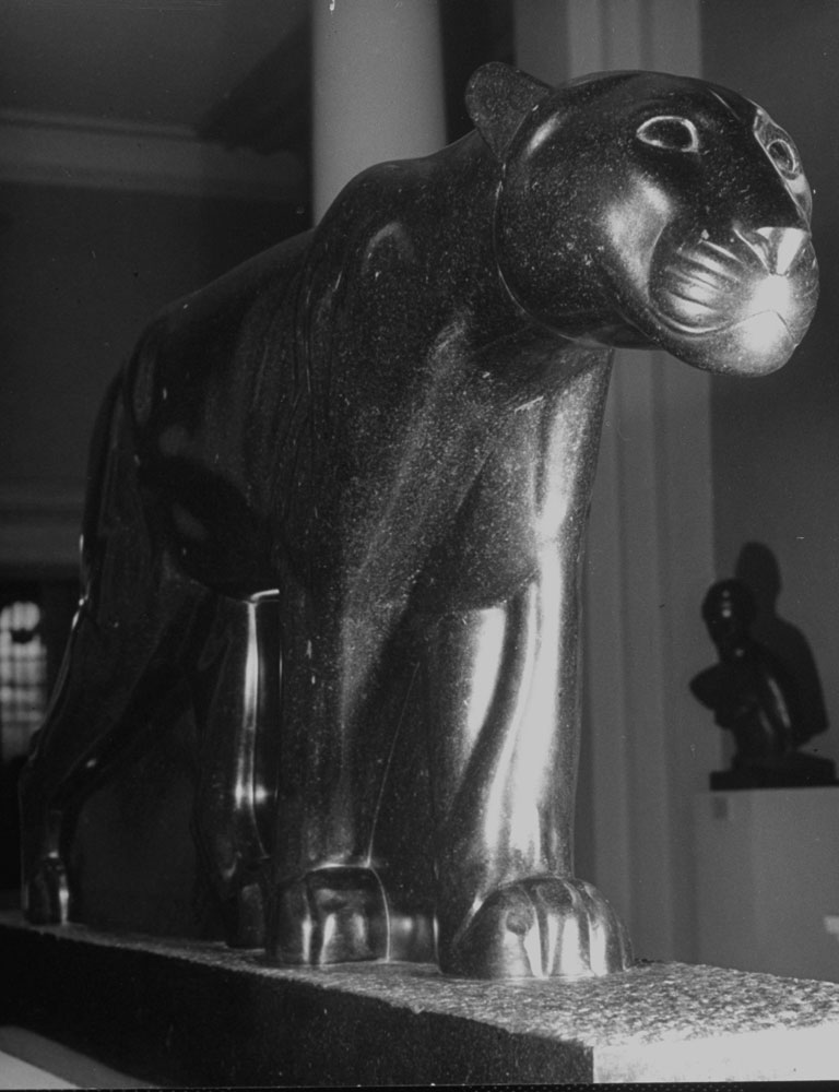 A sculpture of a cat figure walking is seen at the Metropolitan Museum of Art
