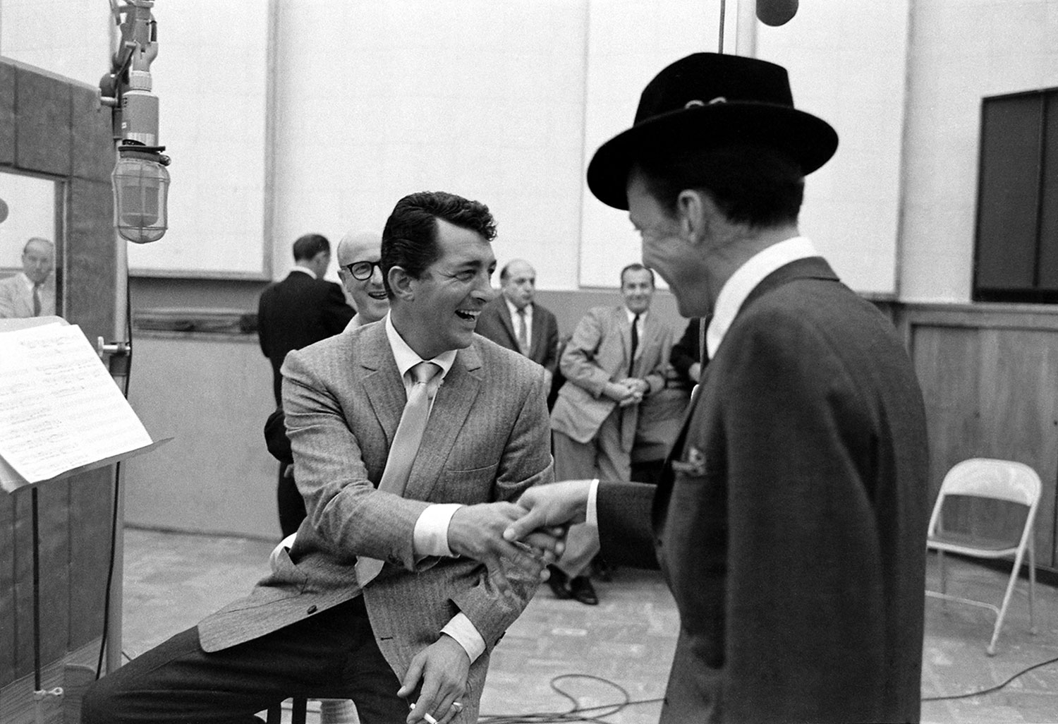 Dean Martin and Frank Sinatra crack up during the Sleep Warm sessions in 1958.