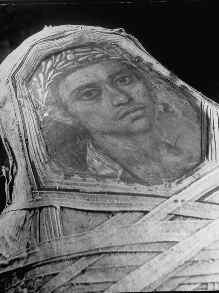 An encaustic portrait of a young man is seen on a mummy's casket, in the Egyptian collection of the Metropolitan Museum of Art in New York, January 1939.