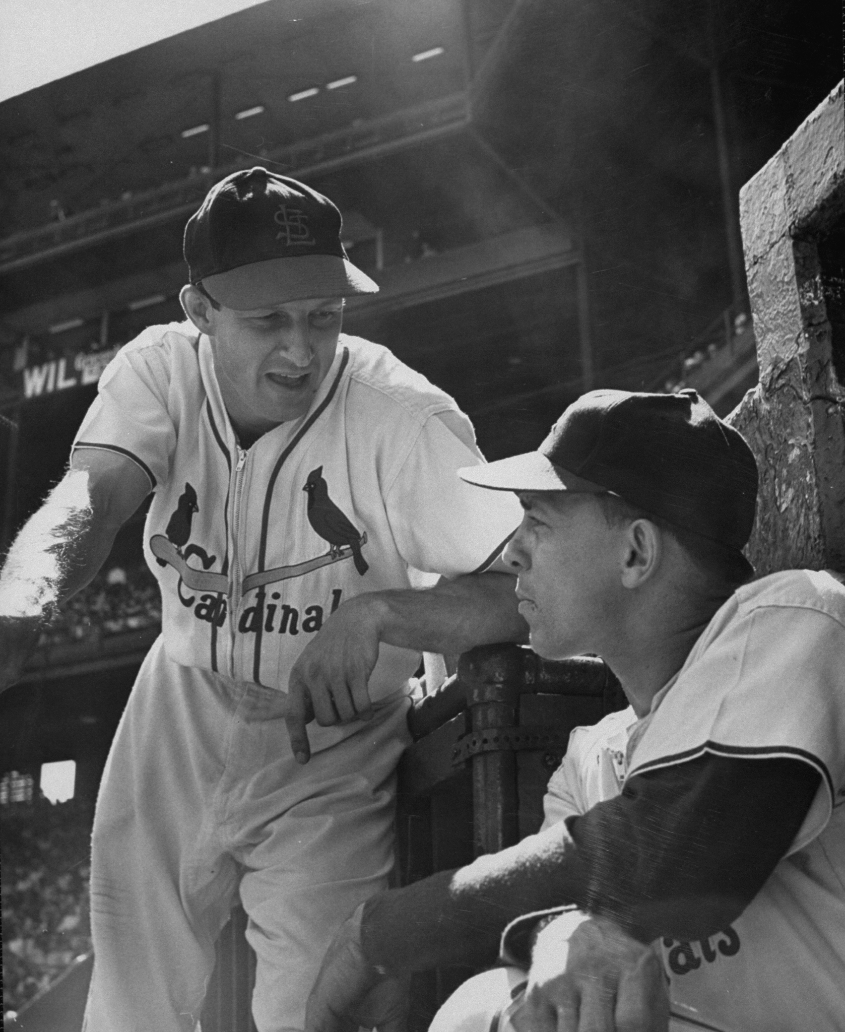 Stan Musial chats with Cardinals player-manager Eddie "The Brat" Stanky in 1952.