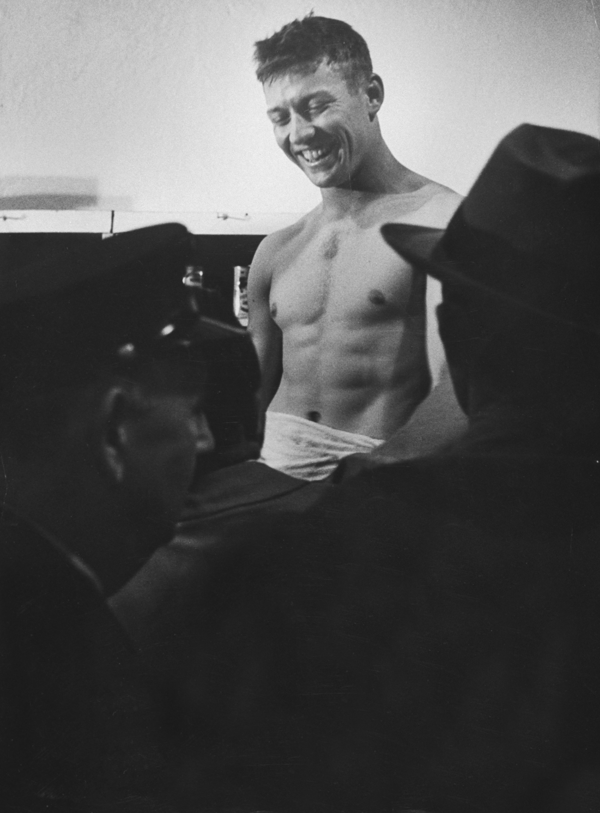 Mickey Mantle shirtless smiles in locker room after winning World Series October 1952