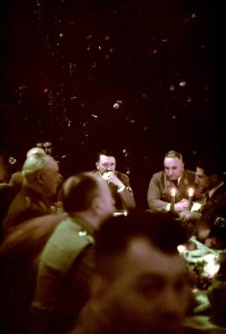 Adolf Hitler and other Nazi officials attend a Christmas Party.