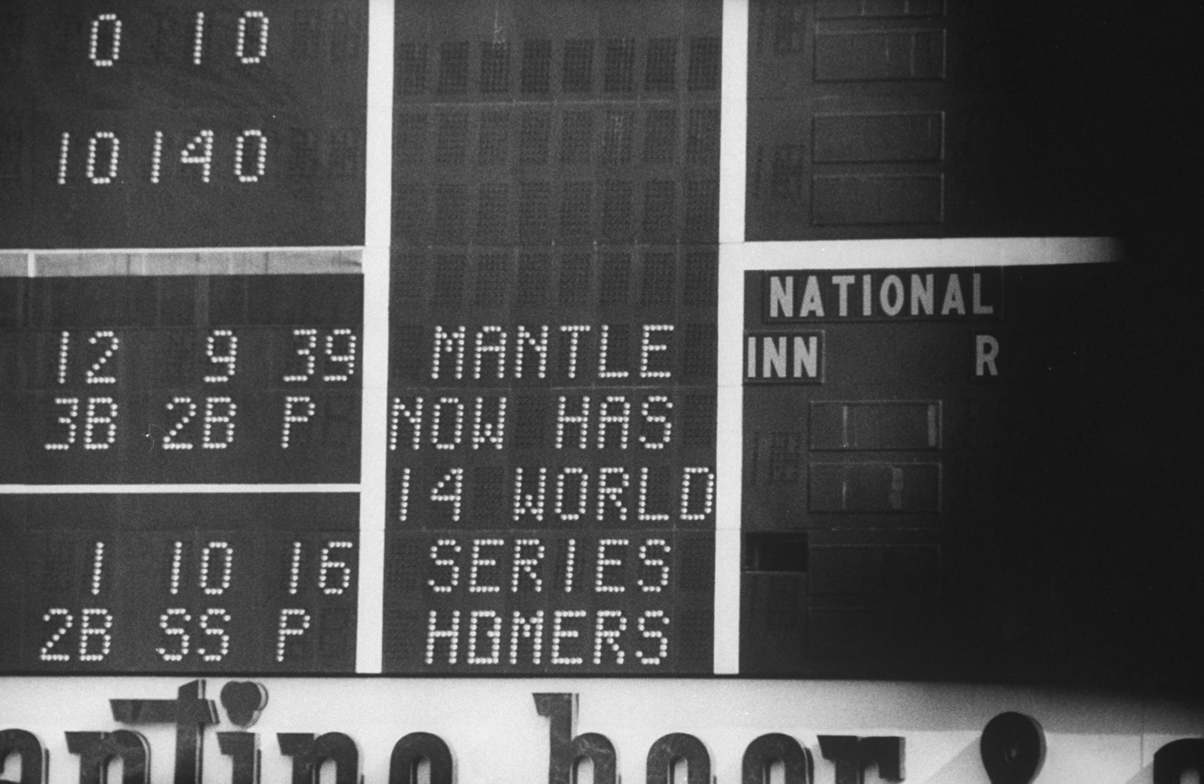 Score board reading "Mantle Now Has 14 World Series Homers," October 1960.