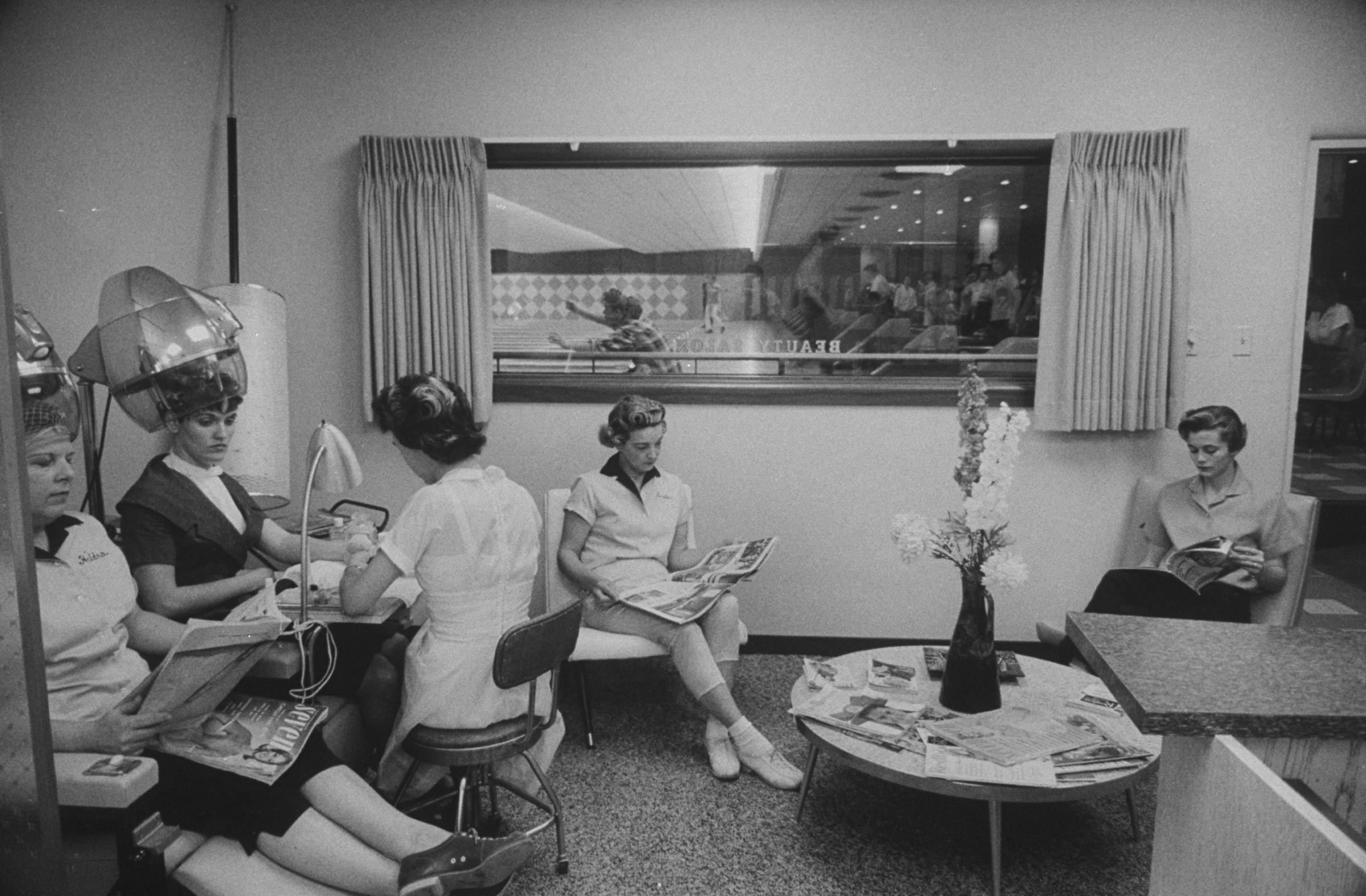Women are pictured in a beauty shop adjoining the Cotton Bowl lanes, for the benefit of women bowlers who can have their hair set between games.