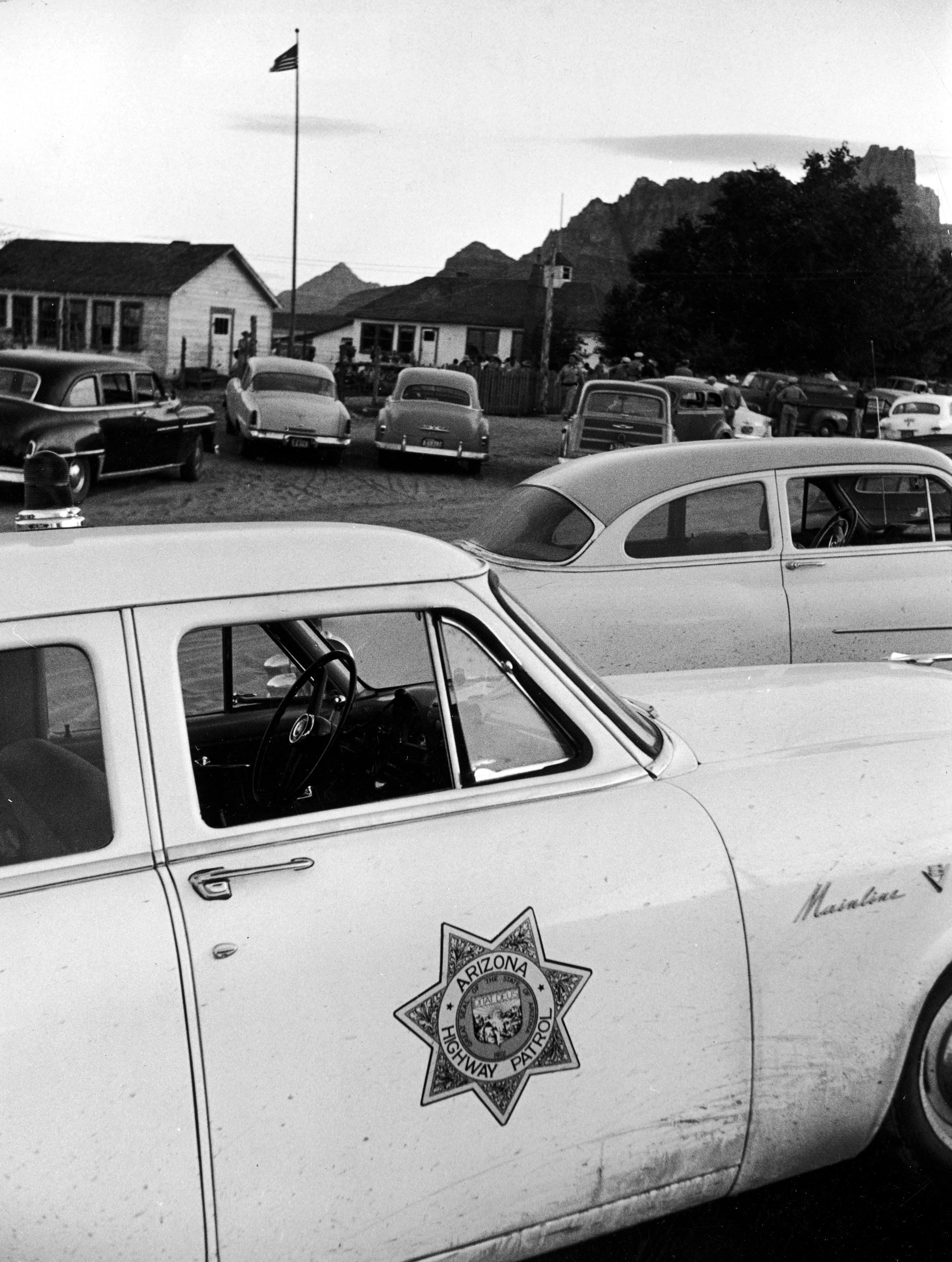Short Creek raid, Arizona, 1953. The building with the flagpole is the Short Creek schoolhouse.