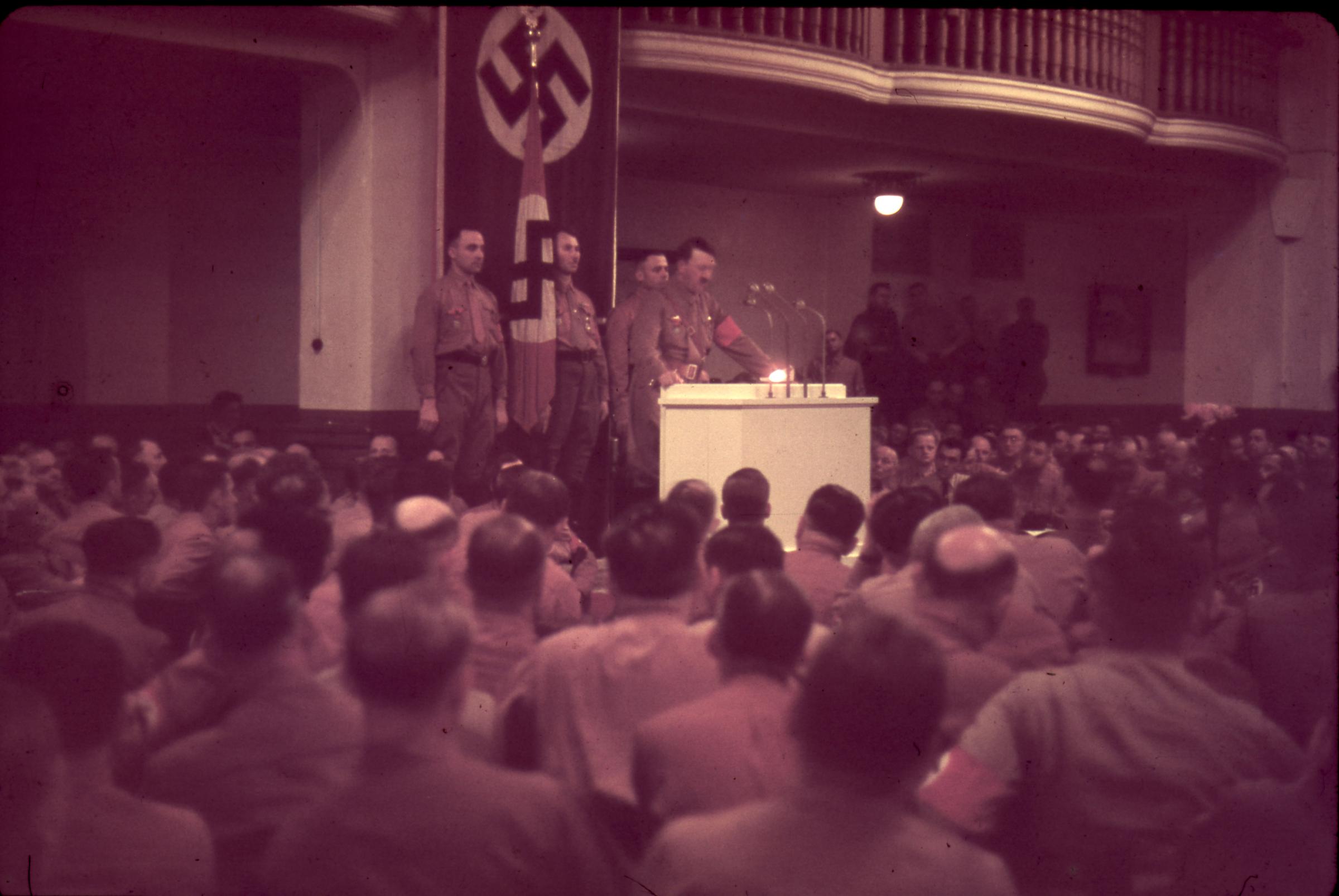Hitler speaks in Munich on the 15th anniversary of the 1923 Beer Hall Putsch, in which Hitler and other Nazi party members attempted to overthrow the German government.