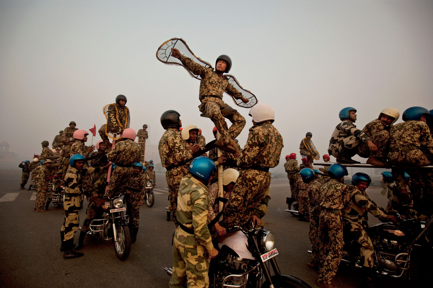 January 12, 2012. Indian soldiers prepare to train on stunt motorcycles in preparation for an upcoming Republic Day parade in New Delhi, India.