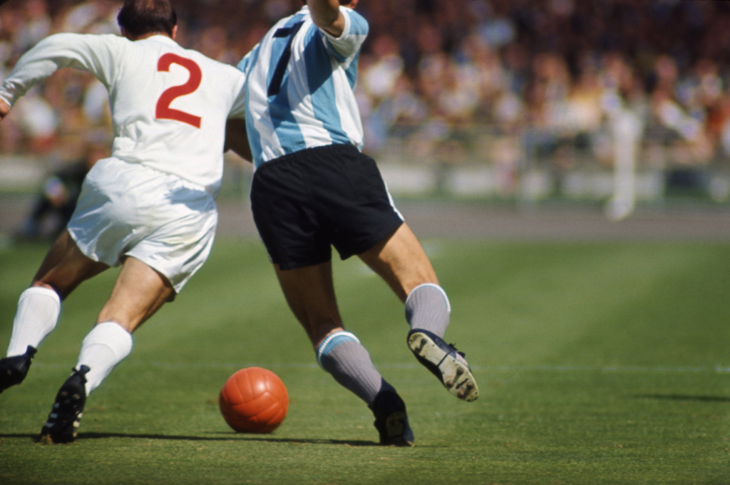 England's George Cohen vies with Argentina's Silvio Marzolini during a World Cup quarterfinal match, 1966.