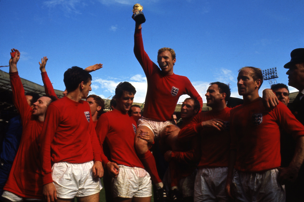 Bobby Moore raises the World Cup trophy, July 30, 1966, after England defeated Germany, 4-2, in the final before 98,000 fans at Wembley Stadium, London.