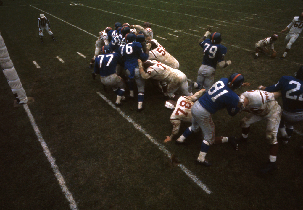 In a game against the Redskins, Grier, Robustelli (#81), and other Giants fight to block an extra point attempt by the 'Skins 6' 2", 230-lb. kicker and guard, Bob Khayat.
